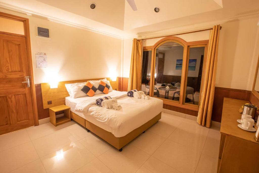 Deluxe Double Room with Balcony and Sea View - Coral Beach Maldives